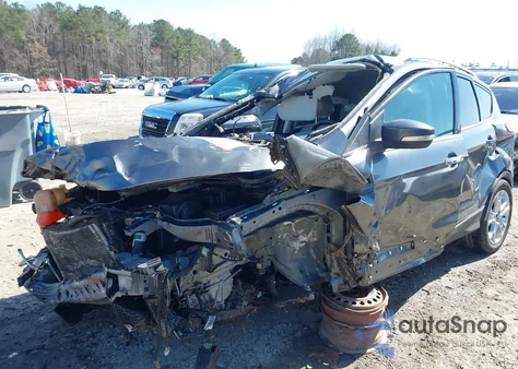 2015 Ford Escape Titanium z USA, uszkodzony, nr VIN 1FMCU0J90FUC10514